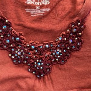 Rodeo/western rust colored long sleeved top